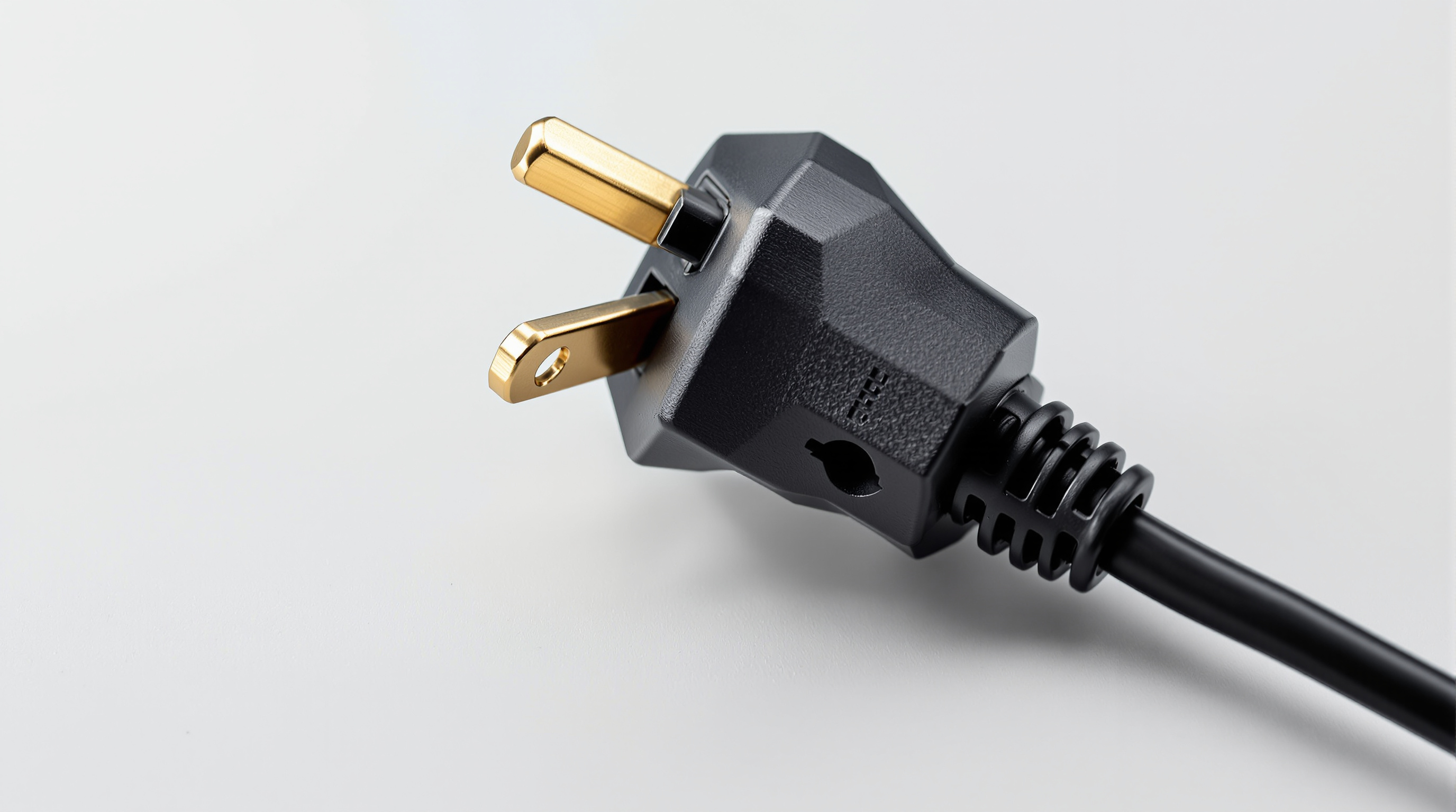 NEMA 5-15P three-prong grounded plug on a black power cord